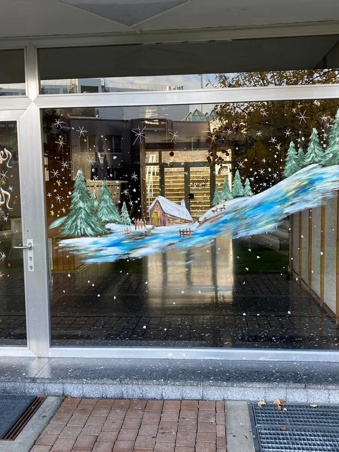 Window painted with a winter landscape
